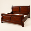 Classic solid mahogany raised-panel bed frame in a clean studio