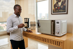 Ramtons digital microwave in an office kitchenette