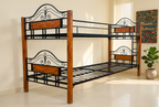 Steel and wood bunk bed in a bright Kenyan bedroom with Mandela Mattresses African artwork