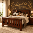 Kenyan couple reading on a solid mahogany Sleigh Mission Bed; mattress and bedding not included