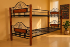 Steel and wood double-decker bed in warm evening light with African-inspired artwork