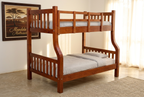 Mahogany double-decker bed styled in a bright bedroom