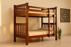 Mahogany double-decker bed in warm light with branded African wall artwork